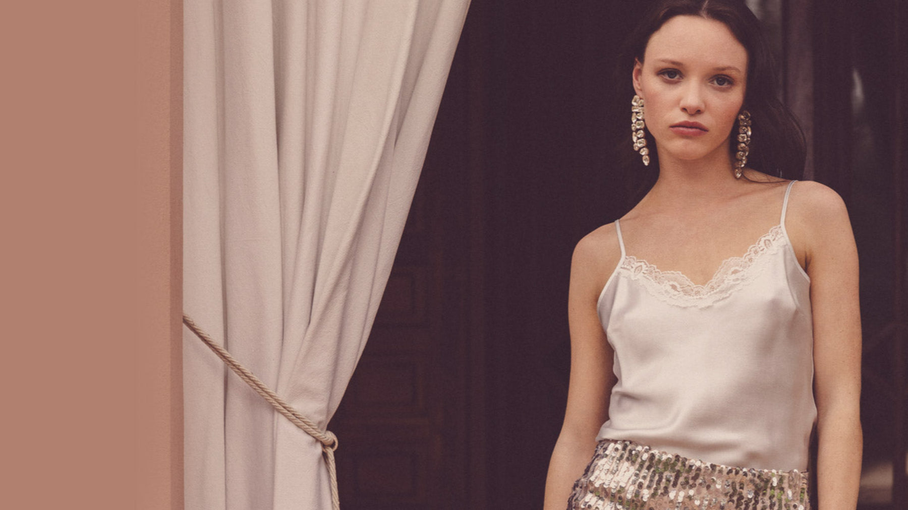 beautiful model in butter yellow silk kimono in tropical location